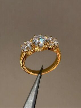 Gold Three-Stone Cubic Zirconia Ring - Elegant Sparkle